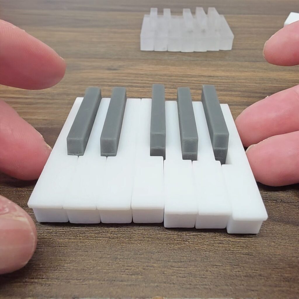 Pocket Piano Keys full octave, precision cut as real piano keys. 7 white and 5 black scaled down to 2.5 inches long, in stl format for 3d printing at foxyheels.com